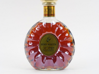 Vente aux enchères 1 BOUTEILLE REMY MARTIN XO PREMIER CRU 
