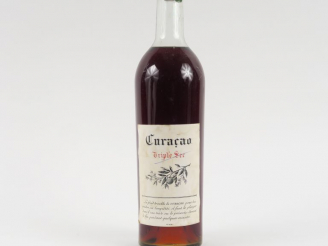 Vente aux enchères 1 BOUTEILLE CURAÇAO TRIPLE SEC - CAPS CIRE
