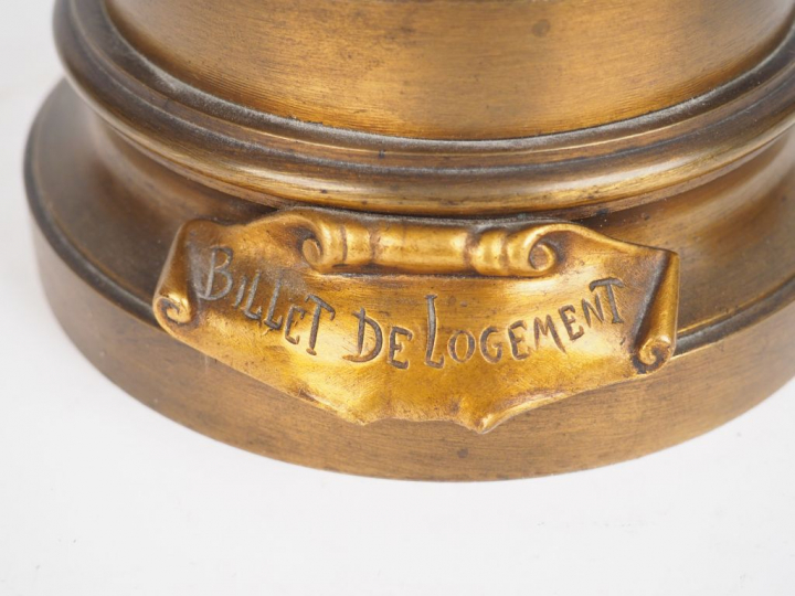 Auguste MOREAU. 'Billet de logement'. Sculpture en bronze à patine méd