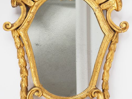 Miroir XIXème de style italien en bois et stuc doré sculpté à décor de