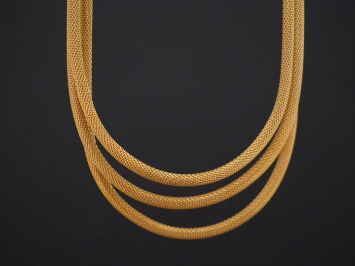 Parure en or jaune, maille tube. Comprenant :  - un bracelet. Long. 18