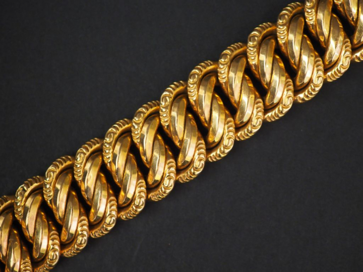 Bracelet articulé en or jaune, maille américaine. Long. 19,5 cm Poids.