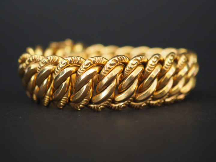 Bracelet articulé en or jaune, maille américaine. Long. 19,5 cm Poids.