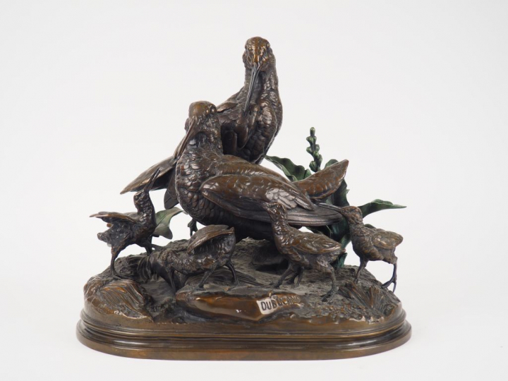 DUBUCAND. "Couple de bécasses et leurs petits" Groupe en bronze à pati
