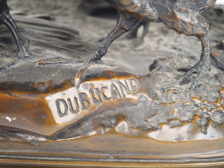 DUBUCAND. "Couple de bécasses et leurs petits" Groupe en bronze à pati