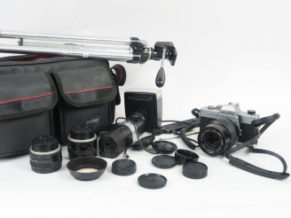 Vente aux enchères MINOLTA SRT101 n°3595973 avec trois objectifs : Objectif MINOLTA MC W.