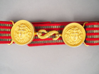 Vente aux enchères Ceinturon d’Officier Général en cuir rouge au revers, avers à décor d’