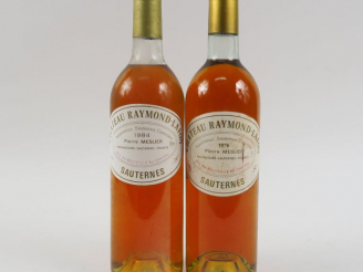 Vente aux enchères 2 BOUTEILLES CHÂTEAU RAYMOND LAFON SAUTERNES - 1 de 1976 BG/1 de 1984 