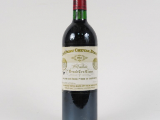 Vente aux enchères 1 BOUTEILLE CHÂTEAU CHEVAL BLANC 1er GCC ST EMILION - 1982 - BG+/ET SC