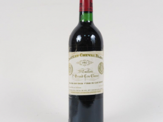 Vente aux enchères 1 BOUTEILLE CHÂTEAU CHEVAL BLANC 1er GCC ST EMILION - 1982 - BG+/ET SC