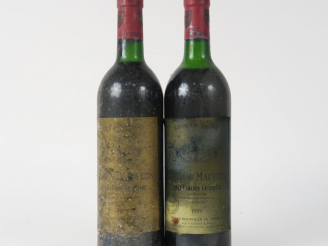 Vente aux enchères 2 BOUTEILLES CHÂTEAU MAUVEZIN GC ST EMILION - 1989 - 1 BG/1 HEP/EA