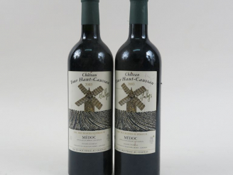 Vente aux enchères 2 BOUTEILLES CHÂTEAU TOUR HAUT CAUSSAN CBS MEDOC - 2003