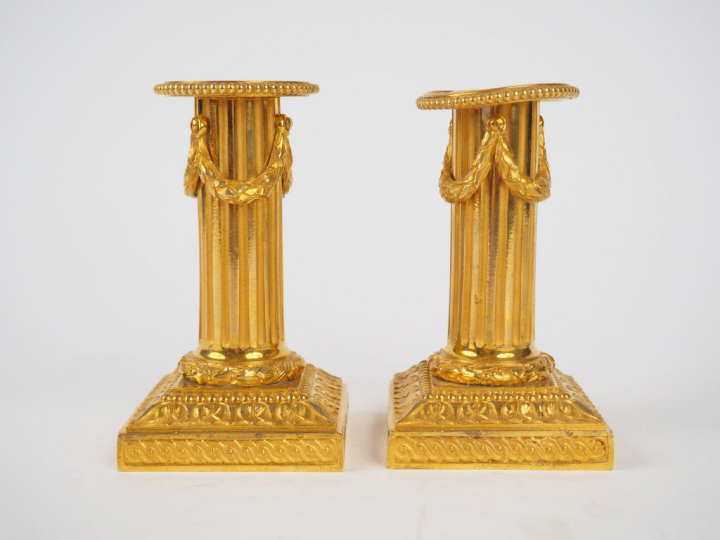 	Paire de bougeoirs de toilette début XIXème de style Louis XVI en bro