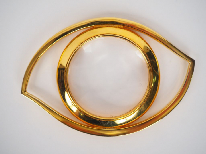 	HERMES. Loupe en forme d'œil d'horus dans son coffret.