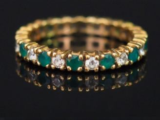 Vente aux enchères Alliance américaine en or, diamants et émeraudes. Poids : 3,32 g