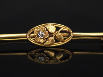 Vente aux enchères Broche 1900 en or et diamant taillé en rose, à décor de fleur. Poids t