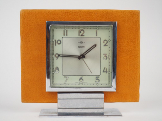Vente aux enchères DEP SAVOY. Réveil de style Art Déco en métal chromé et cuir. Dim : 16 