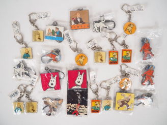 Vente aux enchères 25 portes clés NEUF MOULINSART 1998 (petits et grands)