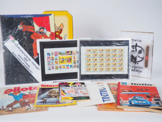 Vente aux enchères 1 lot composé de 1 boite Delacre,3 cigares pharon, 9 calendriers TINTI