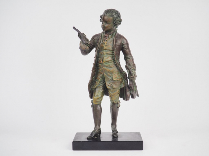 Ecole française XXème. "Mozart". Sculpture en régule à patine brune et