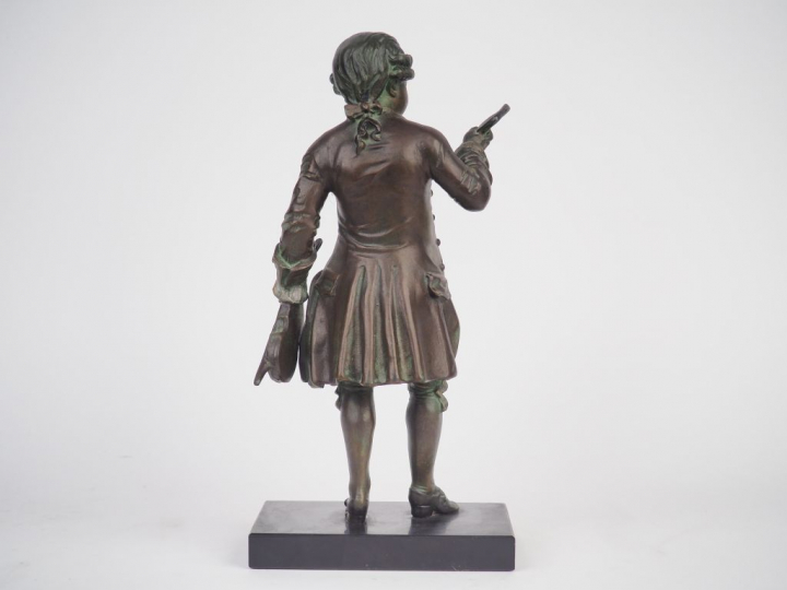 Ecole française XXème. "Mozart". Sculpture en régule à patine brune et