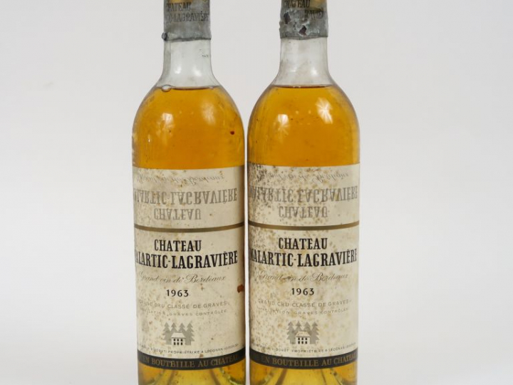 2 BOUTEILLES CHÂTEAU MALARTIC LAGRAVIERE CC GRAVES - 1963 - HEP/CAPS C