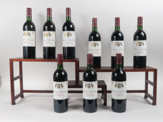 Vente aux enchères 9 BOUTEILLES CHÂTEAU BONALGUE POMEROL - 1985 - CBO - 7 BG/1 LB/1 LB-HE