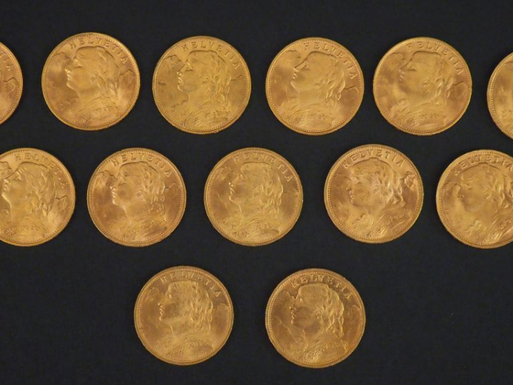 13 pièces de 20 francs suisse or Frais de vente : 5 % TTC