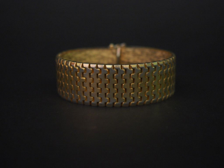 Vente aux enchères Bracelet métal doré maille tank
