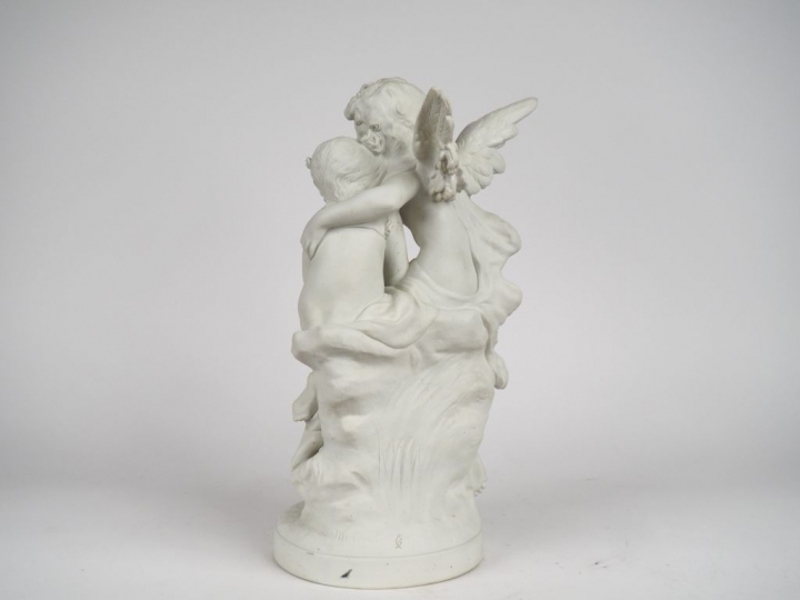 Auguste MOREAU (d'après). "l'ange et la jeune fille" Groupe en biscuit