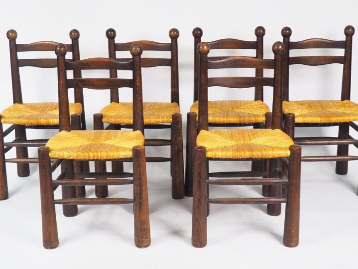 Charles DUDOUYT. Suite de 6 chaises de salle à manger en chêne,  monta