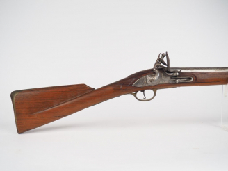 Vente aux enchères Réplique italienne en calibre 75 par PEDERSOLI d'une carabine à silex 