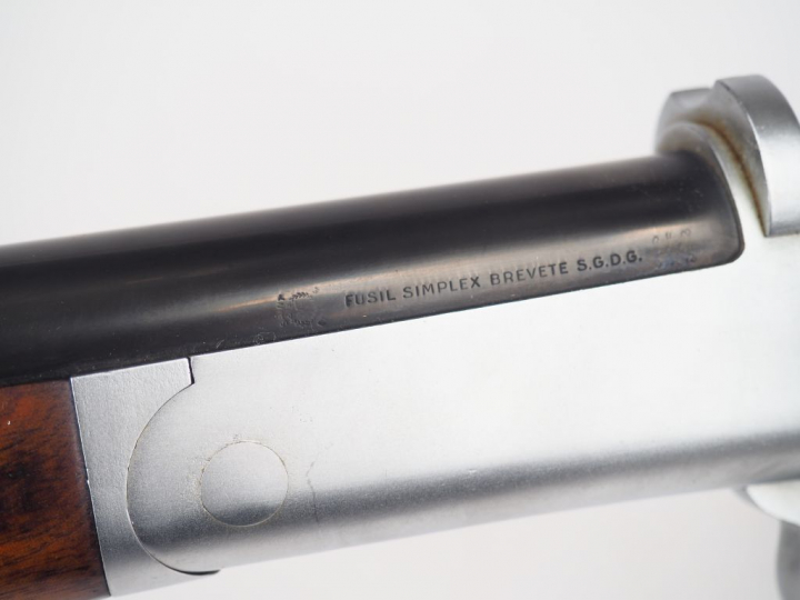 Fusil mono coup simplex calibre 12/70 numéro 281691. garni vieil argen