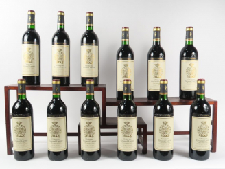 Vente aux enchères 12 BOUTEILLES CHÂTEAU GRUAUD LAROSE GCC ST JULIEN - 1986 - BG