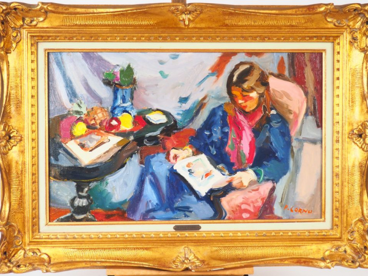 Pierre CORNU. "Jacqueline lisant". Huile sur toile, signée en bas à dr