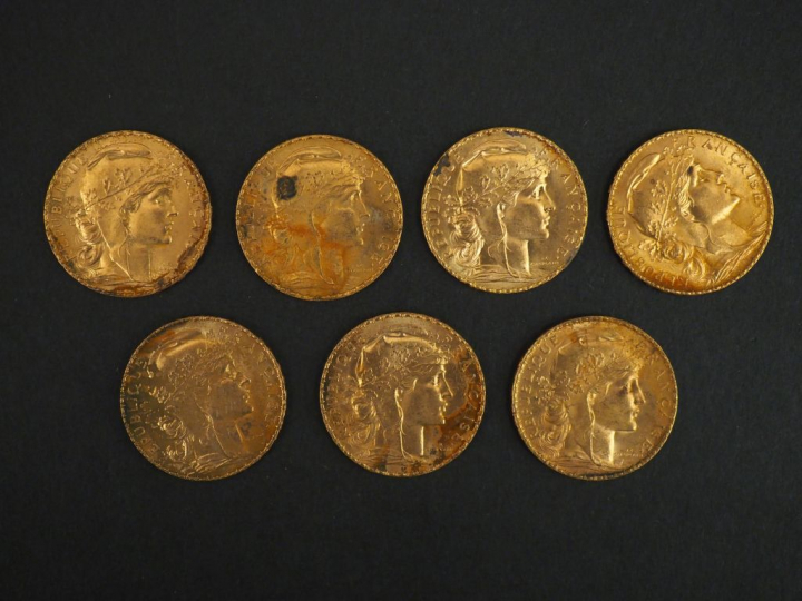 Sept pièces de 20 francs or, 1911.  FRAIS ACHETEURS 5% TTC.