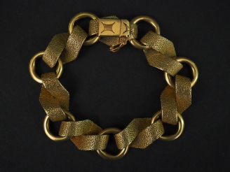 Vente aux enchères Bracelet articulé en or jaune, composé de maillons ronds et maillons l