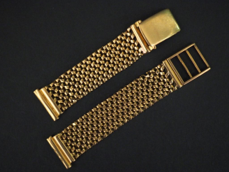 Vente aux enchères Bracelet de montre en or jaune, maille articulée. Long. 14 cm Poids. 3