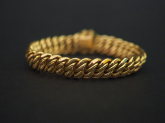 Vente aux enchères Bracelet articulé en or jaune, maille américaine. Long. 19 cm Poids. 1