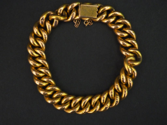 Vente aux enchères Bracelet articulé en or jaune, maille gourmette.  Poids. 21,06 g