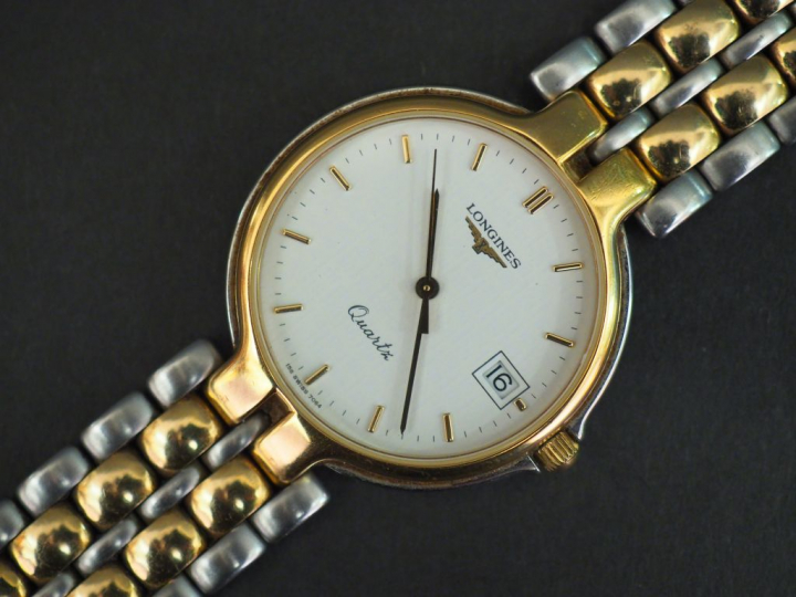	LONGINES, Flagship Montre bracelet en acier et métal doré. Cadran ron