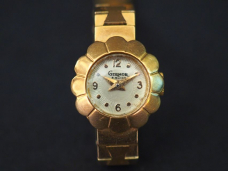 Vente aux enchères GERMOR Montre bracelet de dame, boitier et bracelet en or jaune. Cadra