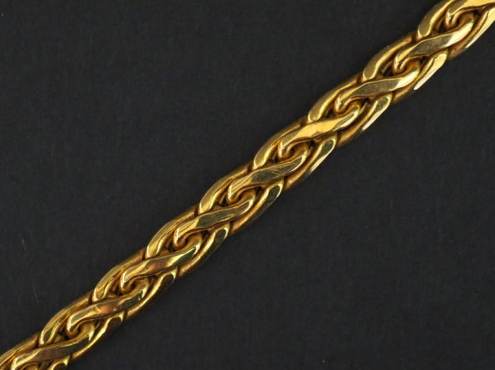 Collier articulé en or jaune, maille plate palmier. Long. 43 cm Poids.