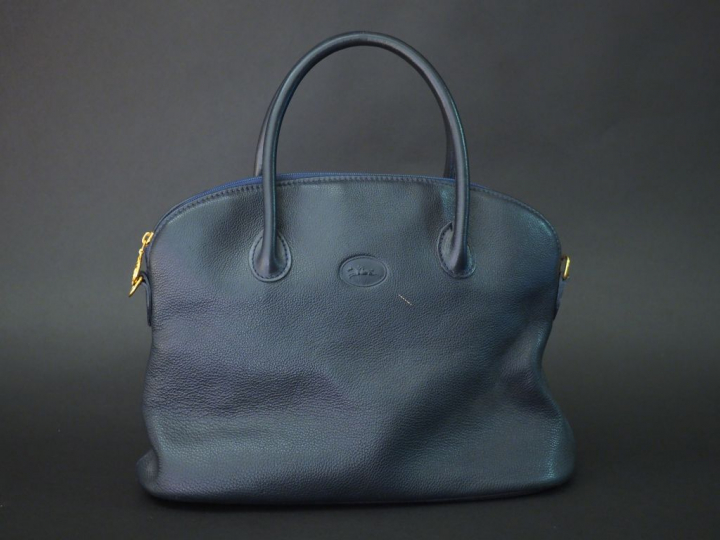 	LONGCHAMP Sac à main en cuir bleu. Double anses, fermeture à zip.  Ba