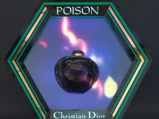 Vente aux enchères Christian DIOR. Plaque publicitaire lumineuse pour le parfum Poison.