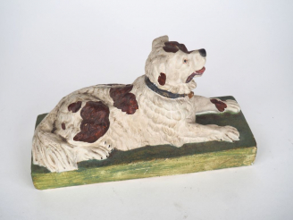 Vente aux enchères Tirelire début XXème en bois et plâtre polychrome figurant un Saint Be