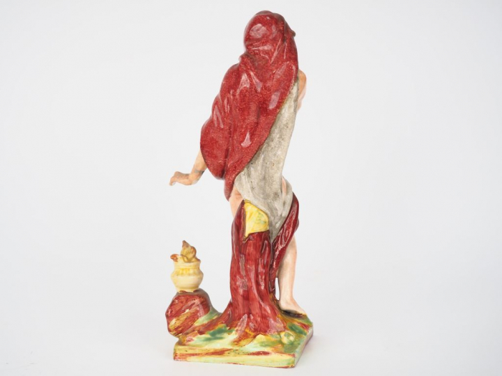 Sujet XVIIIème en faïence polychrome "allégorie de l'hiver". Dim. 22  
