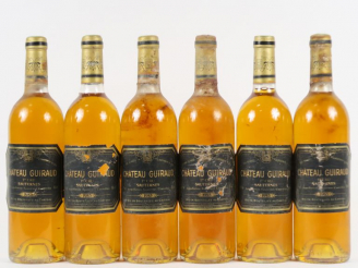 Vente aux enchères 6 BOUTEILLES CHÂTEAU GUIRAUD 1er CC SAUTERNES - 1985 - 5 BG/1 LB/ETLA