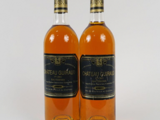 Vente aux enchères 2 BOUTEILLES CHÂTEAU GUIRAUD 1er CC SAUTERNES - 1989 - BG