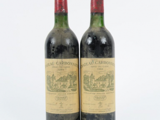 Vente aux enchères 2 BOUTEILLES CHÂTEAU CARBONNIEUX GCC GRAVES - 1984 - LB/BS